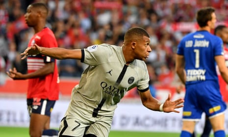 Kylian Mbappé runs towards the crowd after scoring his record-equalling first goal of a hat-trick that demolished Lille.