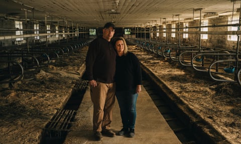Ron and Lori Wallenhorst in their empty barn in Cuba City, Wisconsin. “It’s quiet, eerily quiet, for the first time in 50-some years. It’s pretty strange,” Ron said. 