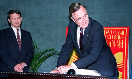 The then US president, George Bush, signs the United Nations climate change convention on 12 June 1992 in Rio de Janeiro.