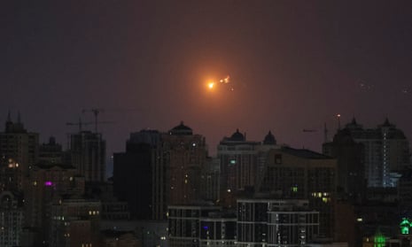 A Russian missile explodes over Kyiv on Sunday