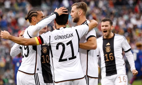 Ilkay Guendogan celebrates with teammates after scoring the 1-1 equaliser.