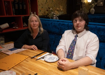Rose-Marie and Lucas sitting next to each other at a restaurant table