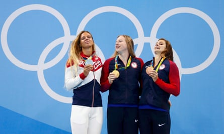 Yulia Efimova with her silver medal, alongside US pair Lilly King and Katie Meili.