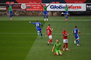 Danny Ward of Cardiff City (centre) celebrates with his team mates after scoring his side’s first goal.