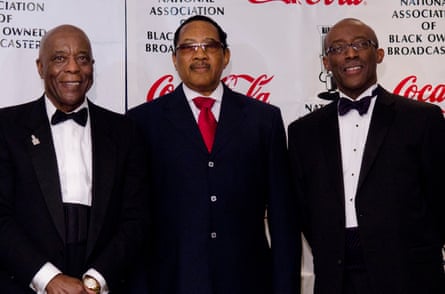 three men on red carpet