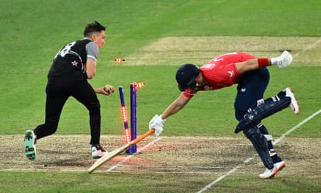 Liam Livingston of England just about makes his crease and avoids being run out by Trent Boult of New Zealand.