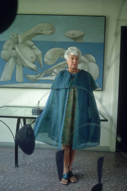Peggy Guggenheim standing in front of a Picasso’s On the Beach at the Peggy Guggenheim Museum, Venice.