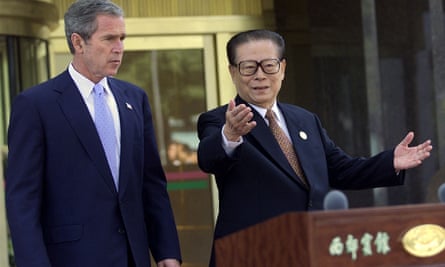 Jiang Zemin with the US president George W Bush at a press conference during the Asia Pacific Economic Cooperation (APEC) summit in 2001.