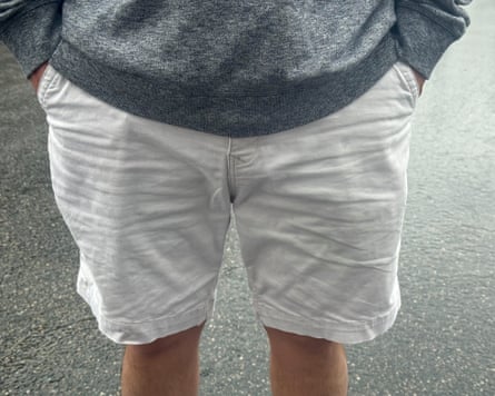 A man in white shorts.