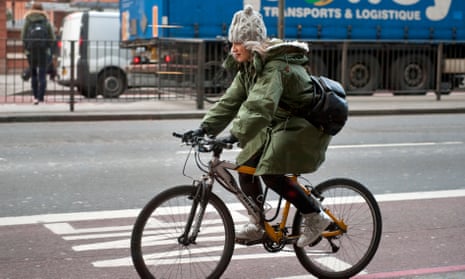 Woman cycling on Euston Road