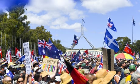 Thousands of people take part in a Convoy to Canberra protest outside Parliament House in Canberra