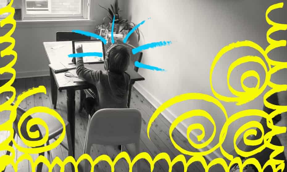 Child sitting at a computer at home