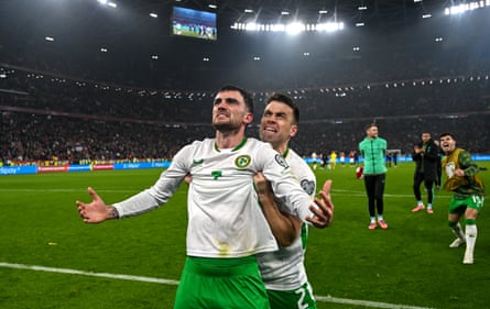 Séamus Coleman and Troy Parrott celebrate the Republic of Ireland’s win in Hungary in November 2025