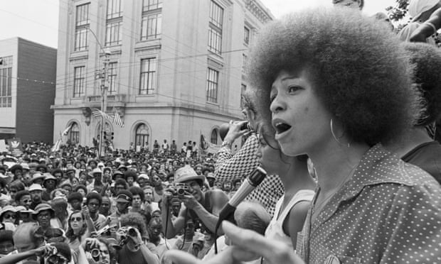 Angela Davis speaks at a street rally in Raleigh.