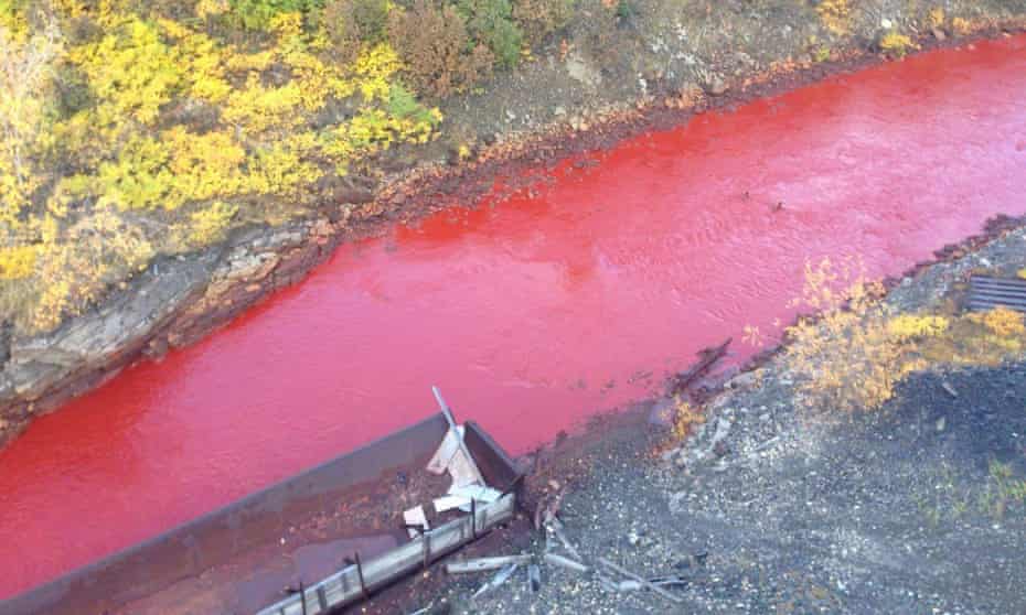 The red Daldykan river in Norilsk, Russia