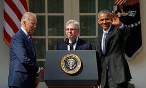 Judge Merrick Garland (C) shakes hands with Vice-President Joe Biden (L) as President Barack Obama waves after Obama announced Garland as his nominee to the U.S. Supreme Court in the Rose Garden of the White House, March 2016.