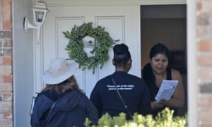 A resident takes voter registration paperwork from Democratic party precinct chairs Angela Orr Heath, center, and Myla Senn, left, in Garland, Texas, Saturday, on 18 January 2020, before the pandemic made in person activities impossible.