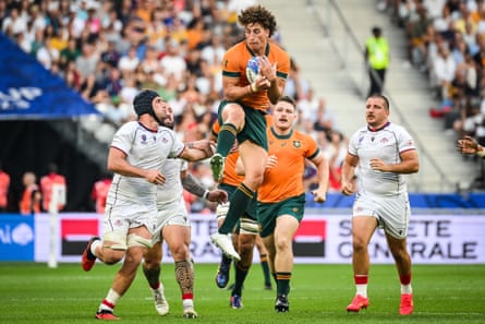 Mark Nawaqanitawase catches the ball in the air against Georgia