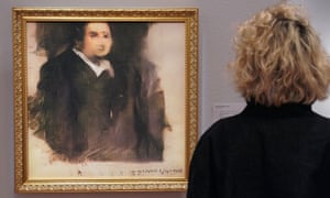 A woman views Portrait of Edmond de Belamy. The artwork was created using an algorithm designed by the French collective Obvious.