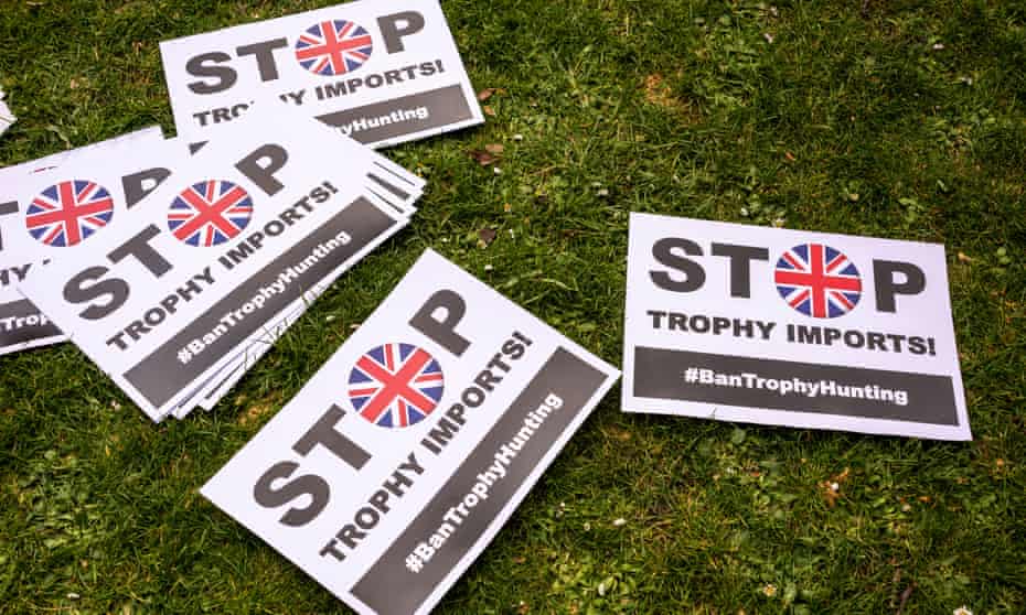 Placards at a stop trophy hunting and ivory trade protest rally in London.