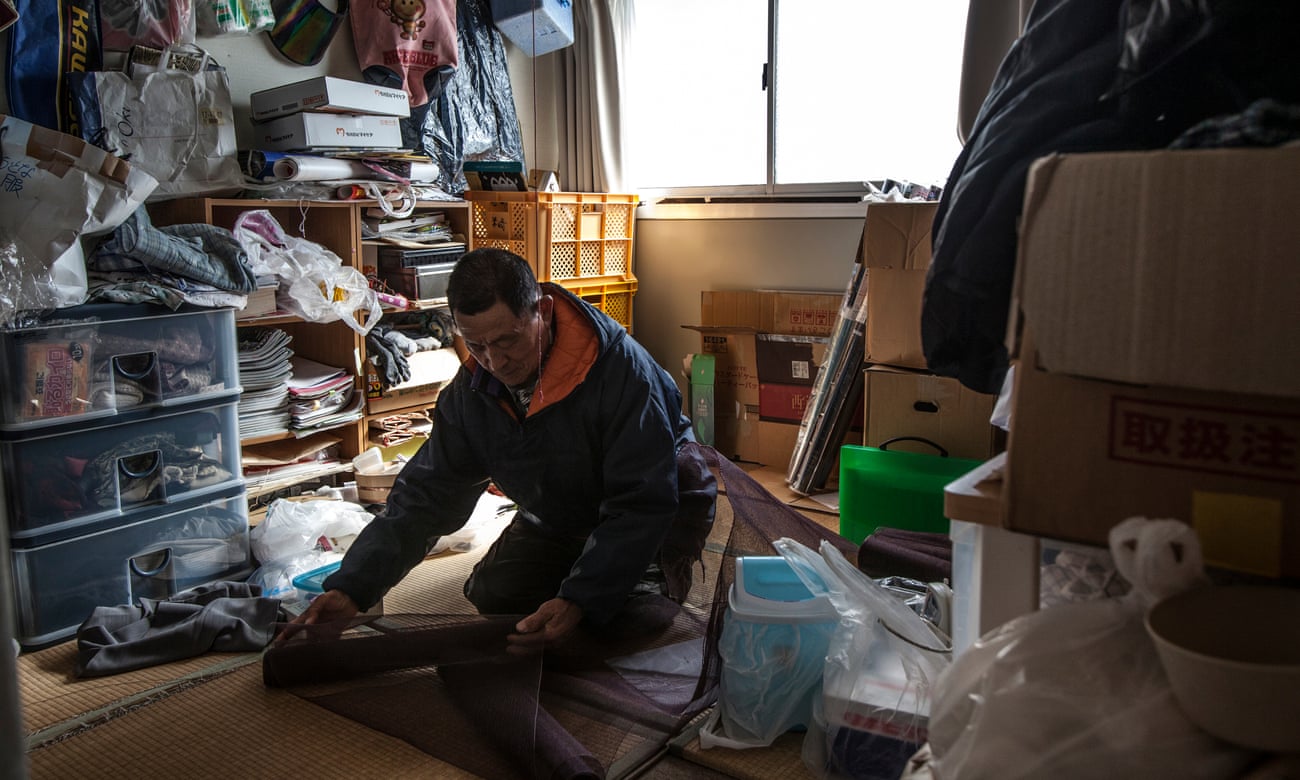 Fisherman Kichiro Sato in the temporary home he shares with son Kazuo, who left the sea after the tsunami to help lead their community’s recovery.