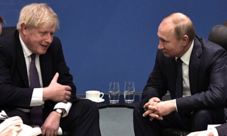 Boris Johnson meets Russian president Vladimir Putin during the International Libya Conference in Berlin in January 2020.