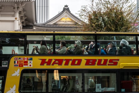 a double decker sightseeing bus at the Ginza district in Tokyo