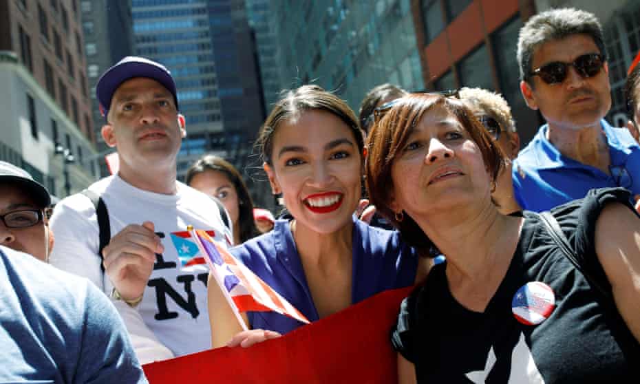 Alexandria Ocasio-Cortez at the Puerto Rican Day parade in New York on Sunday. Ocasio-Cortez is an avowed Democratic socialist.
