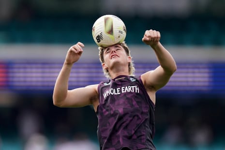 Jacob Bethell warms up with a football.