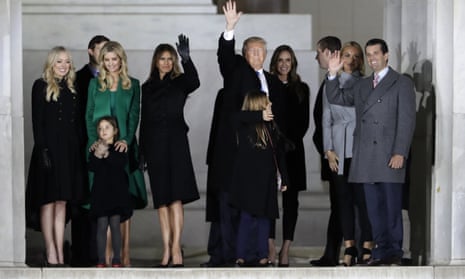 President-elect Donald Trump and his wife Melania Trump stand with family.
