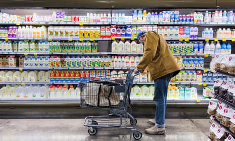 A man shops for dairy products at a Whole Foods grocery store in Bethesda, Maryland, USA, 14 February.