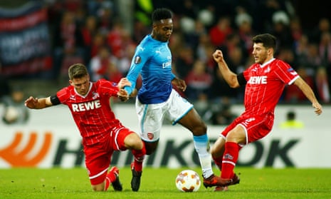 Arsenal’s Danny Welbeck in action with Cologne’s Salih Ozcan and Milos Jojic.