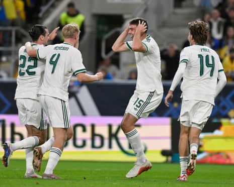 Northern Ireland players celebrates after Ciaron Brown scored their third goal against Ukraine
