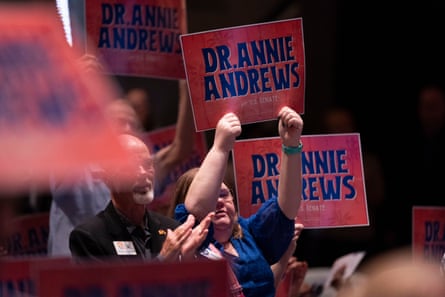 people holding signs