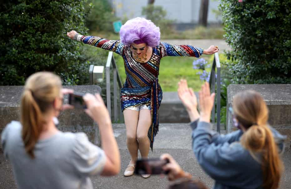 Elsa Touche, with Meals on Heels, bows while performing during a food delivery in September.