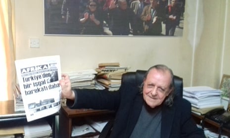 Şener Levent holds a copy of Afrika