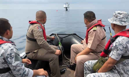 Thai naval officers and marine police inspect a ‘seastead’ in the Andaman Sea off the coast of Phuket island, southern Thailand.