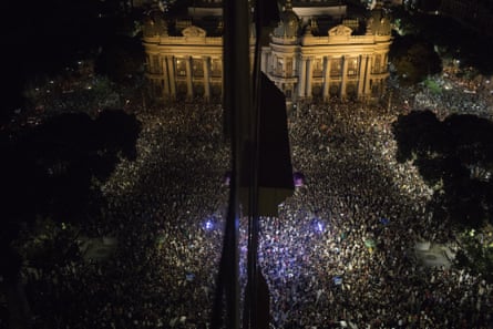 Thousands gather in front the Municipal Theater in downtown Rio de Janeiro, during a protest against the death of Marielle Franco.