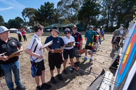 Group of archers check their scores