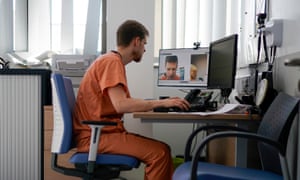 Dr Judah Eastwell, a GP at St Johns medical centre in Altrincham, UK, consults a patient via a video link to their home. (Photo by Christopher Furlong/Getty Images)