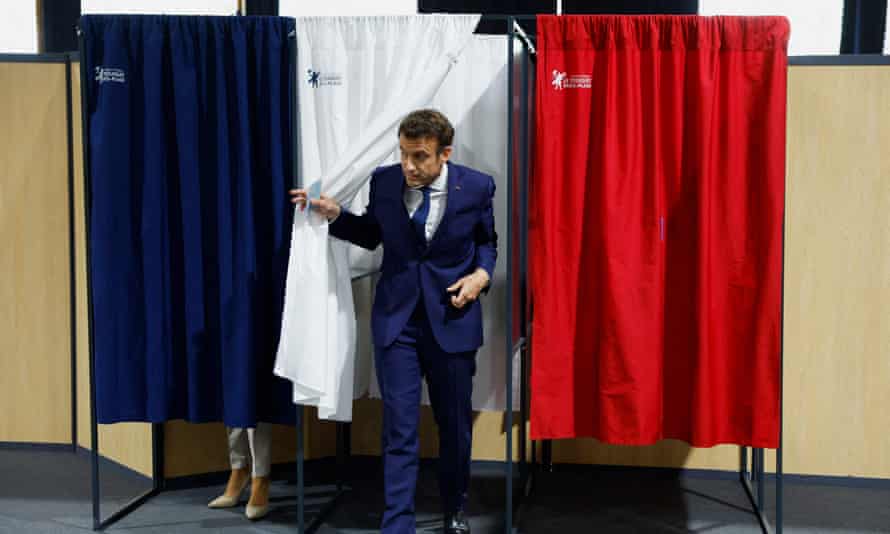 Macron casts his vote in Le Touquet, northern France.