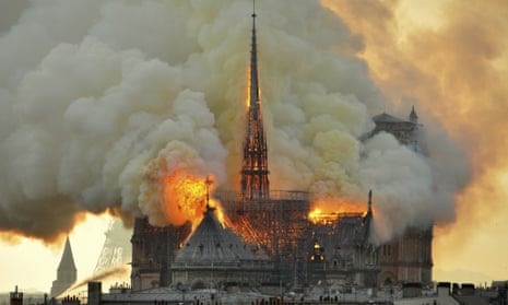 Flames and smoke rise from Notre Dame Cathedral in Paris on Monday.