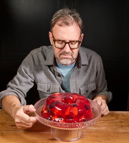 Tim with a red jelly filled with fruit