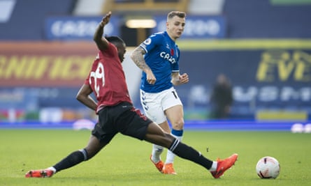 Everton’s Lucas Digne tries to find a way past Aaron Wan-Bissaka of Manchester United.