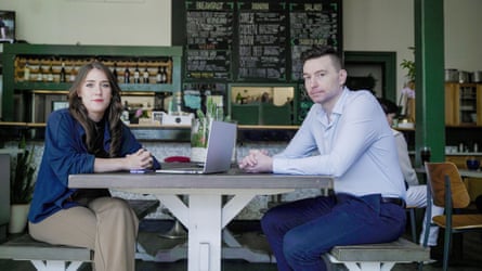 Marianna Spring and Matt Motyl sit opposite each other in a cafe; Marianna has a laptop open.
