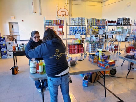 Volunteers sorting and sanitizing supplies at a distribution point in Tuba City Juvenile detention center, Arizona.