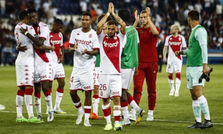 Monaco players greet their fans after a 1-1 draw in Paris.