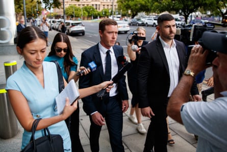 Rohan Dennis, centre, has admitted an aggravated act likely to cause harm but he is not being held criminally responsible for his wife’s death.