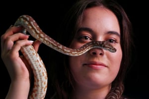 Woman holding snake