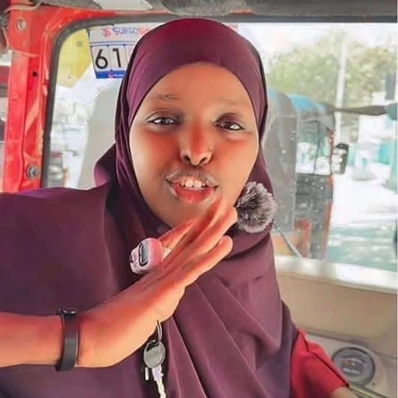 Sadia Moalim Ali wearing a headscarf sitting in a vehicle in traffic